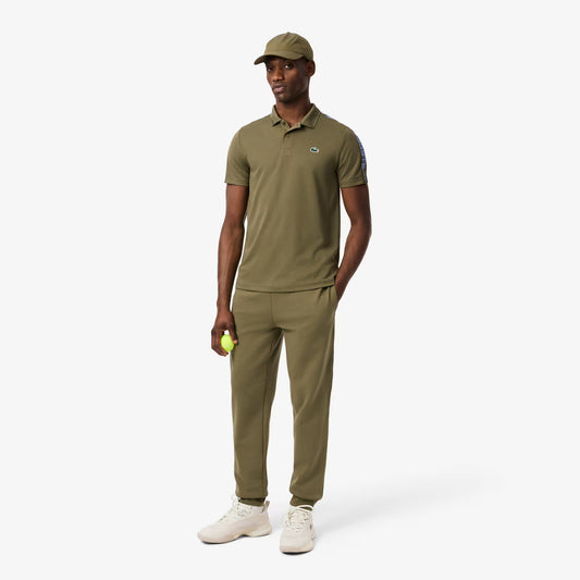 Polo de tennis à rayures Ultra Dry de marque