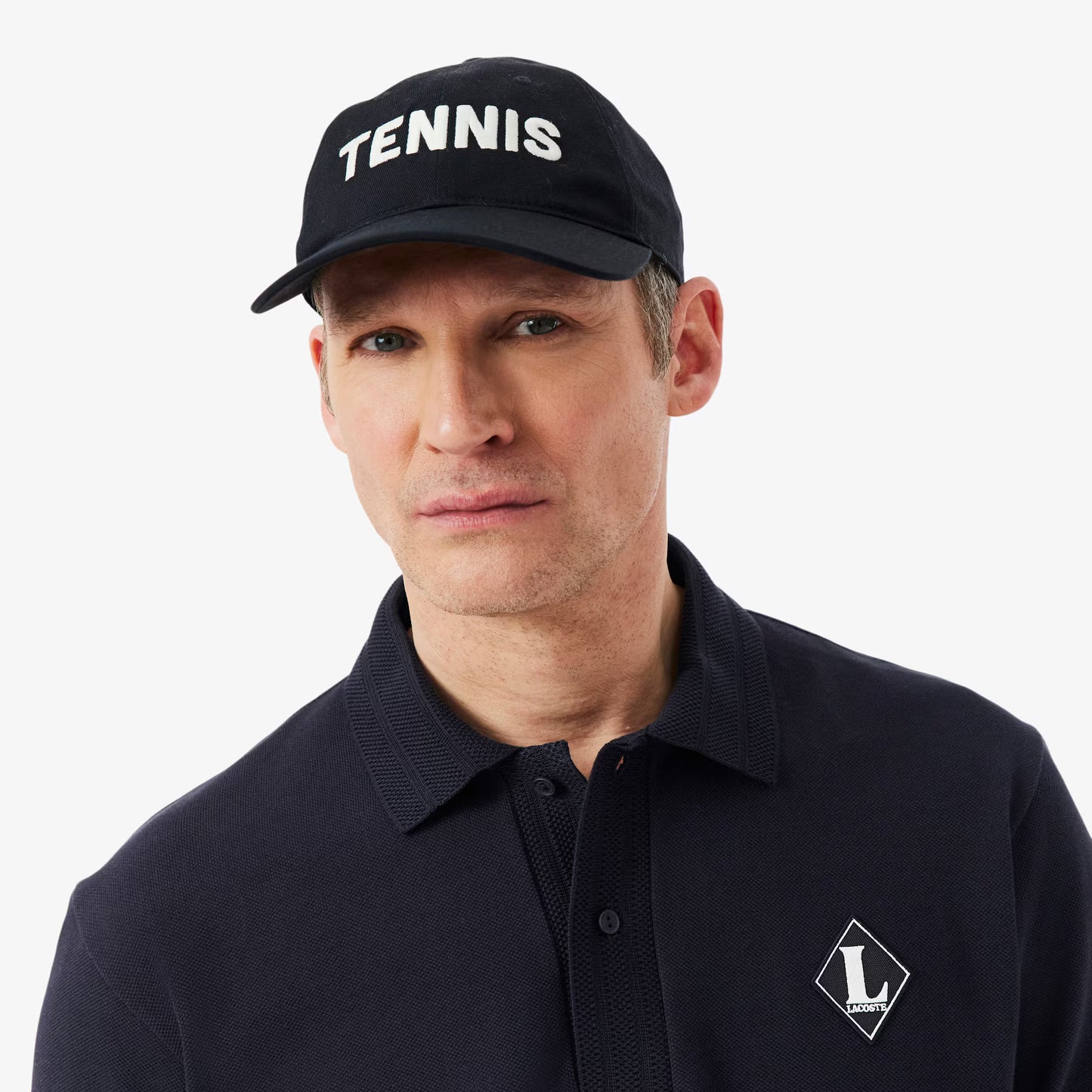 Französisches Polo-Shirt mit Badge im klassischen Schnitt